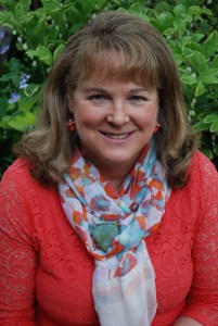 Laura portrait pic in coral top 5-10-15